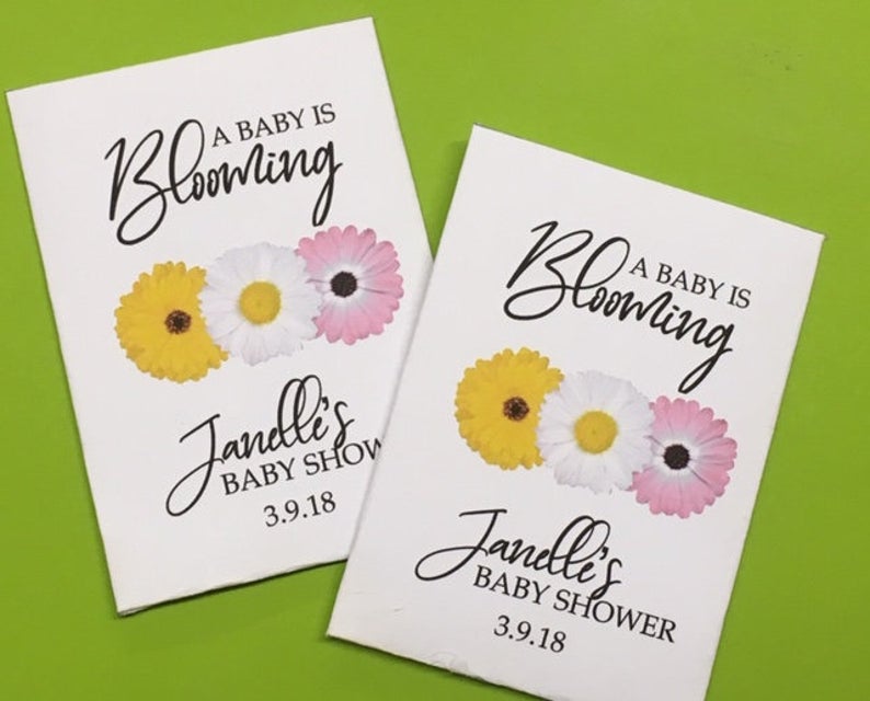 pink and yellow baby shower seed packets favors